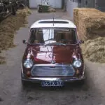 The front image of the whole dark red Mini Classic, taken from a high standpoint
