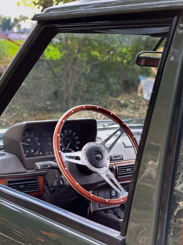 range rover classic with wooden steering wheel